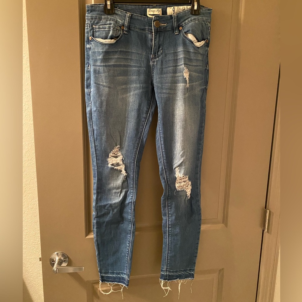 Medium wash skinny distressed jeans